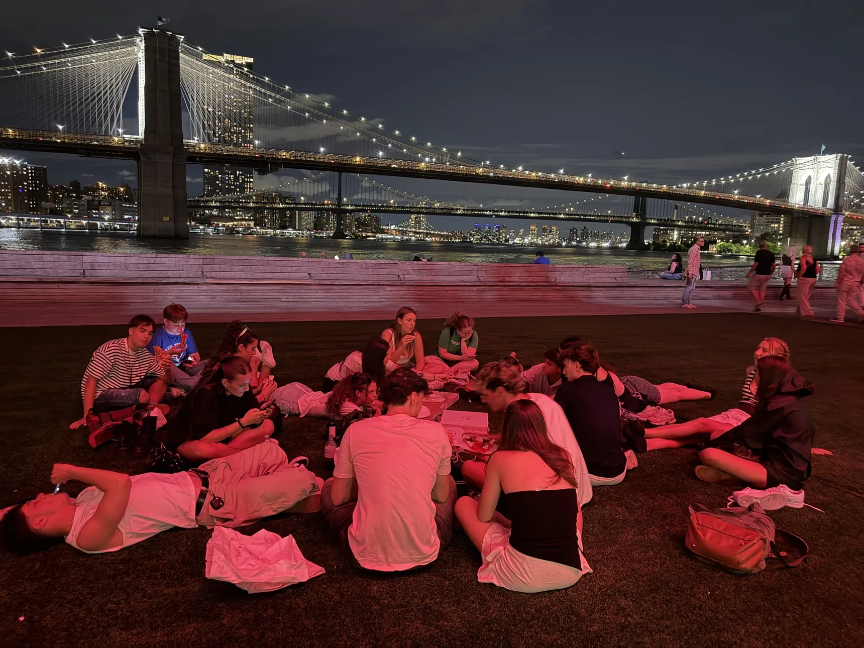 An evening at Brooklyn Bridge Park, with the bridges lit up